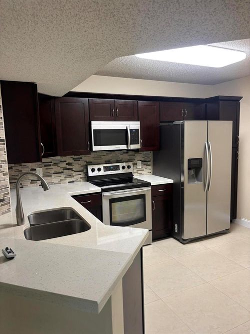 304-8761 Wiles Rd, Coral Springs, FL, 33067-1864 | Card Image