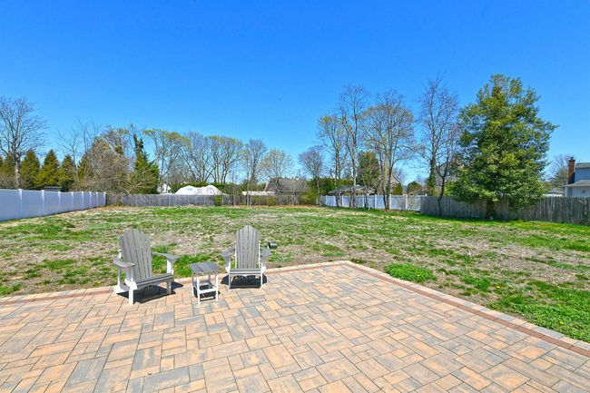 View of patio featuring a fenced backyard | Image 36