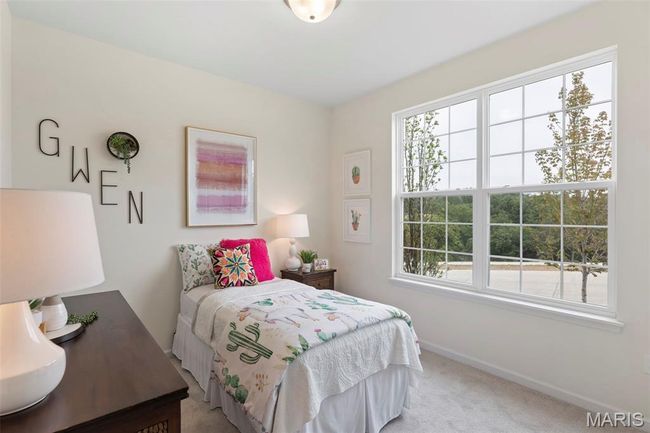 Carpeted bedroom with baseboards | Image 7