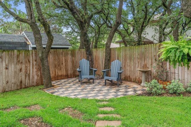 Fenced backyard featuring a patio area | Image 34