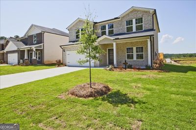 7756 Richmond Trail, House other with 4 bedrooms, 2 bathrooms and 2 parking in Fairburn GA | Image 2