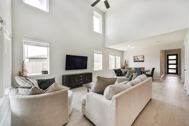21606 Laggan Cliff Ln, House other with 5 bedrooms, 3 bathrooms and 2 parking in Cypress TX | Image 6