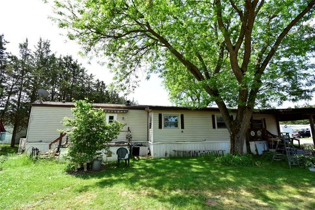 Rear view of house with a lawn | Image 14