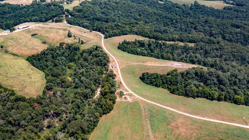 000 Neon Sky Drive, Pineville, MO, 64856 | Card Image