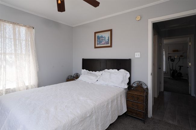 Bedroom featuring ornamental molding and ceiling fan | Image 22