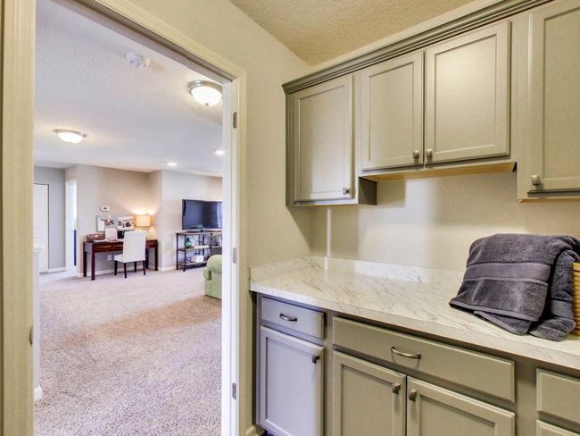 Photos are of a former model home. Actual home is under construction. | Image 14
