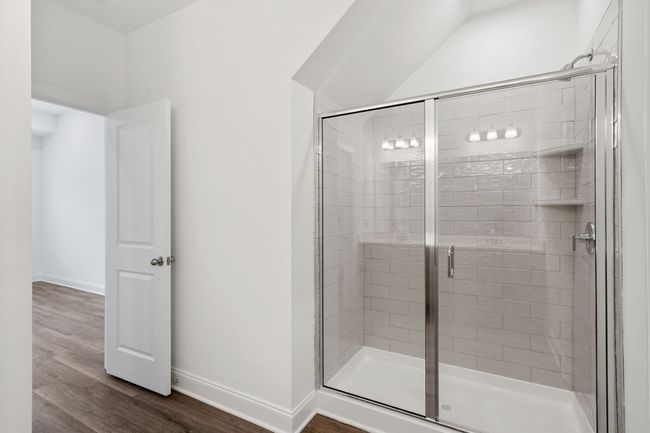 Glass door and custom tile in the primary shower! | Image 22