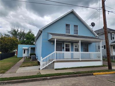 Bungalow-style house featuring a porch | Image 1