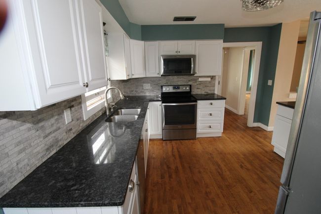 Plenty of cupboard and counter space | Image 15