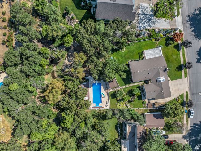 Aerial view of property and surrounding area with a pool | Image 50