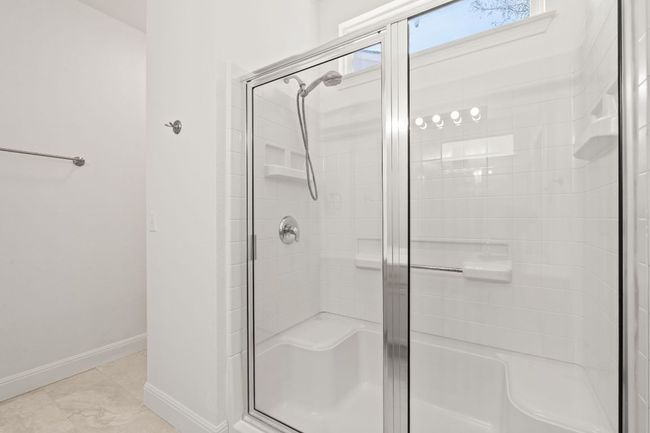 Bathroom with baseboards and a stall shower | Image 25