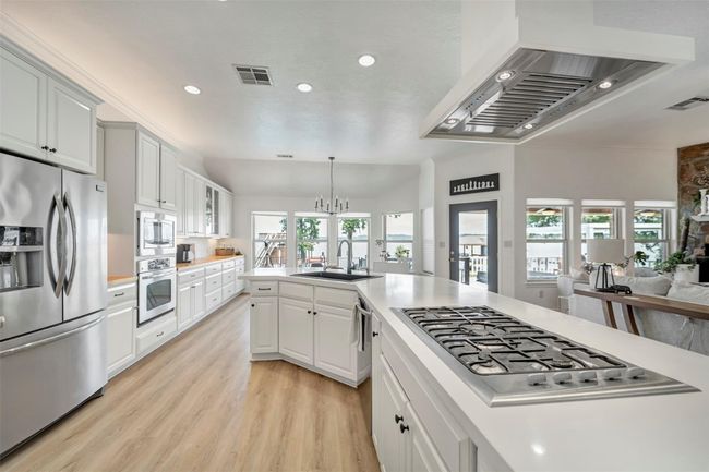 A chef’s dream kitchen — overflowing with cabinet space, endless counters, and room to create culinary magic | Image 17