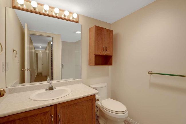 Full bathroom featuring vanity and a shower | Image 18