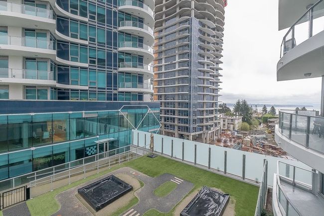 View of property featuring a city view and fence | Image 15