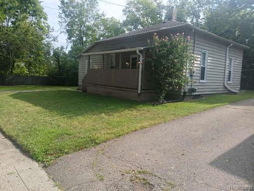 1409 Lyons Ave, Lansing, MI, 48910-1758 | Card Image