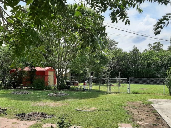 View of yard with a gate | Image 4
