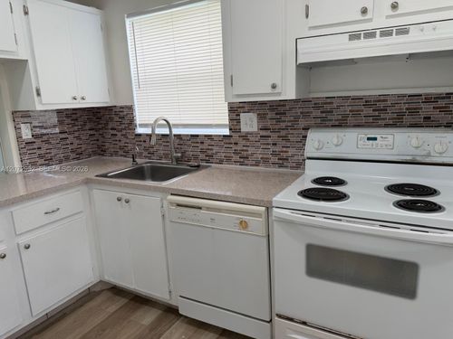 j310-8380 Sands Point Blvd, Tamarac, FL, 33321-3876 | Card Image