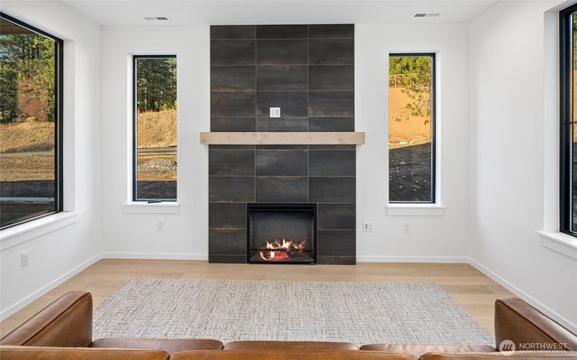 As the newest PNW master-planned community, enjoy 200+ acres of open space, trails & the Coal Trax Mt Bike Park. Soaring ceilings in the great roommake each day worthy of celebration & open floorplan appeals to entertaining. Covered deck & patio. Southern-facing homesites range from the mid600s- 900ks. Enjoy a variety of innovative & distinctive new home options with the best all-season recreation just moments away! Built for the future, indulge in a retreat just 90-min to Seattle. Plans and elevations are artist’s renderings only, may not accurately represent the actual condition of a home asconstructed and may also contain options and upgrades which are not included in the sale. Trailside Homes reserves the right to make changes to the floorplan, specifications, dimensions, design and elevations without prior notice. Stated dimensions and square footage are estimated and should not be usedas representations of the home’s actual size. | Image 23