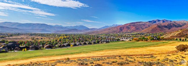 Property view of mountains featuring a residential view and golf course view | Image 4
