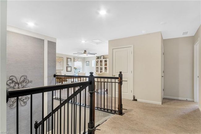 Beautiful staircase and railing to second floor. | Image 20