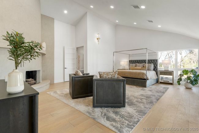 Huge primary suite with floor to ceiling stucco fireplace | Image 43