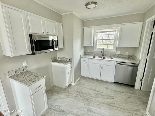 1108 Gay St, House other with 3 bedrooms, 1 bathrooms and 2 parking in Brownsville TN | Image 4