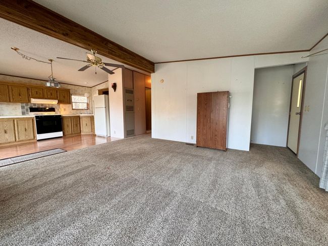 Small vault opens up the floor plan a bit with a side door to the deck | Image 9