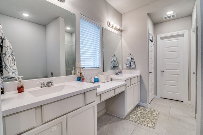 Full bathroom with vanity and tile patterned floors | Image 16