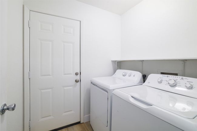 Robust laundry room to tackle and store your laundry needs. | Image 26