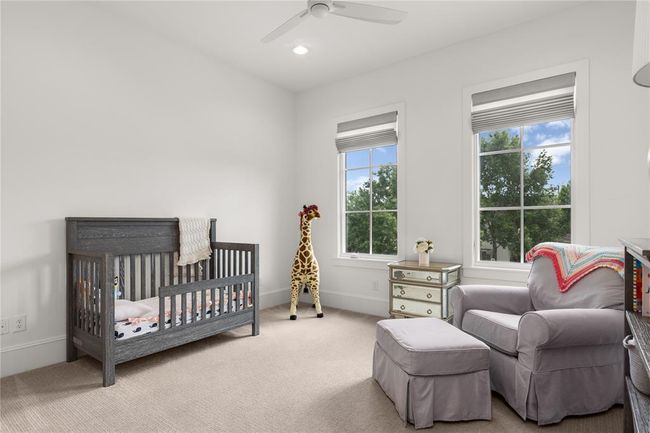 Secondary bedroom w/ a generously sized closet. | Image 39