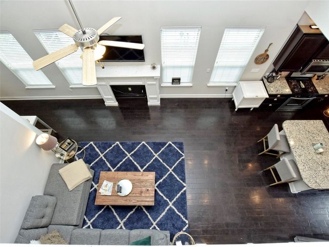 View from railing upstairs in gameroom | Image 7