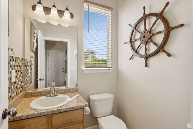 Bathroom featuring toilet and vanity | Image 17