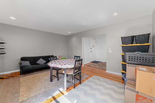 Dining space featuring baseboards, wood finished floors, and recessed lighting | Image 11