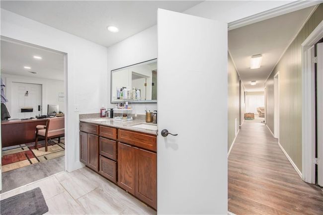 Full bath with a sink, recessed lighting, baseboards, and double vanity | Image 13