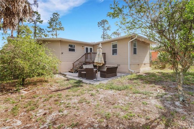 Larged fenced in backyard with patio area! Great space for kids/pets to run around or entertaining friends/family! | Image 28