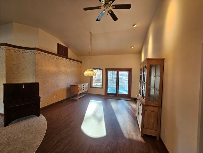 The dining area is just off the living room and kitchen. | Image 13