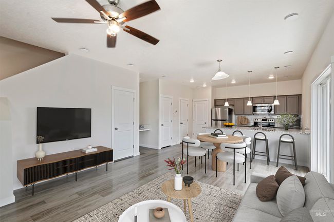 Living area with light wood finished floors, a ceiling fan, and recessed lighting | Image 20