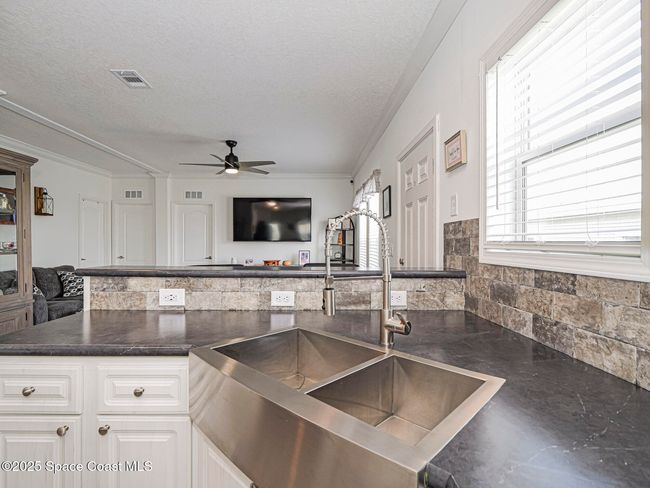 623 Hyacinth Cir, House other with 3 bedrooms, 2 bathrooms and null parking in Barefoot Bay FL | Image 19