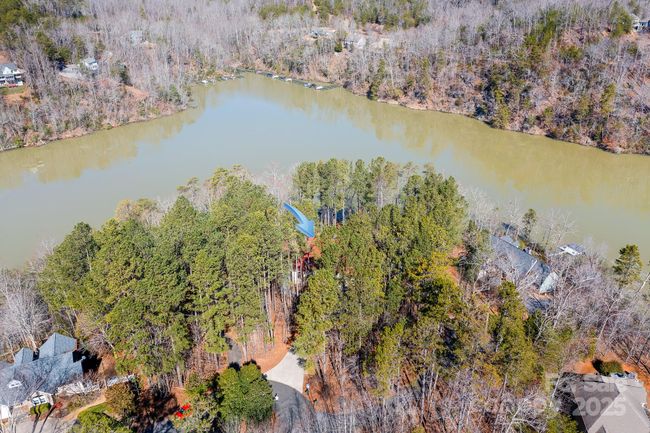 Amazing property of 1 acre on Lake Adger! Sweeping views of the lake year round. | Image 42