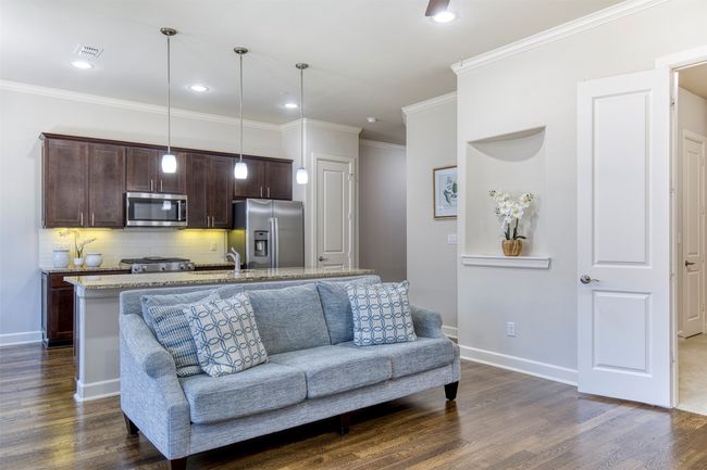 Living room with decorative niche. | Image 7