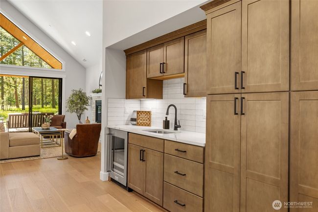Kitchen offers an expansive wet bar great for entertaining. | Image 7