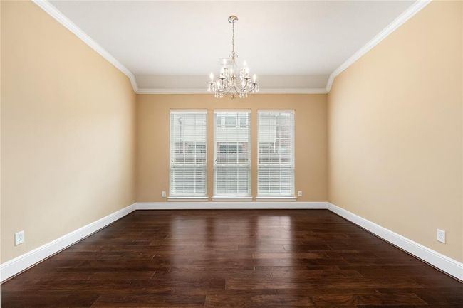 Enjoy family dinners or host intimate gatherings in the formal dining room. | Image 7