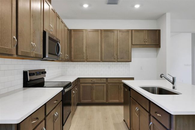 2980 Supermarine Loop, House other with 4 bedrooms, 3 bathrooms and null parking in TAVARES FL | Image 13