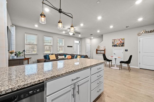 Whether you're whipping up a quick snack or preparing a multi-course meal, this kitchen, with its crisp lines and polished finishes, is designed to inspire your inner chef | Image 13