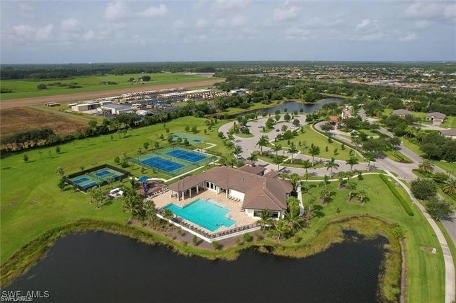 Drone / aerial view of a pool and a large body of water | Image 21