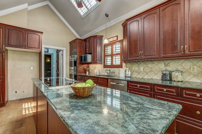 Kitchen also features 3 large skylights | Image 7