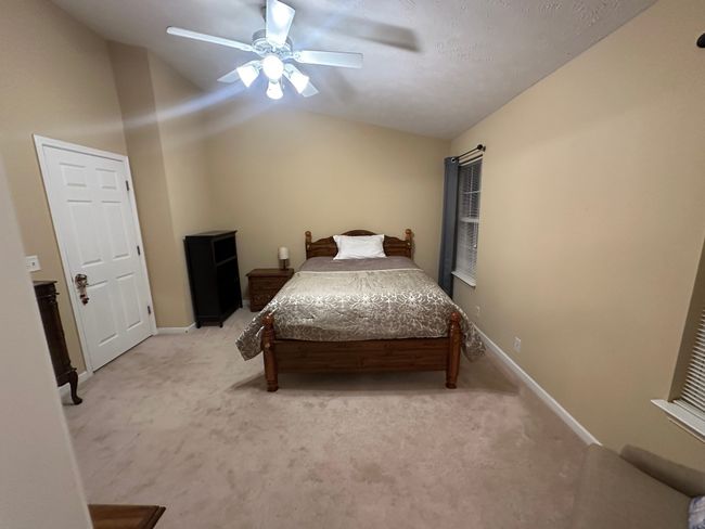 Primary bedroom at 13x14. We could not show the secondary bedroom as it is currently in use by one of the sellers children & asked that we honor his privacy. it measures in at 10x14 & is quite spacious with an attached full bath & walk in closet | Image 35