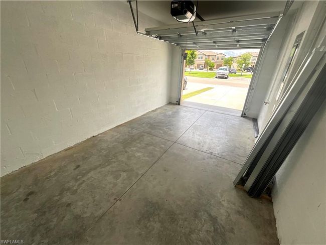 Garage featuring a garage door opener | Image 25