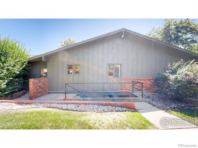 Side Yard, entrance in to shared basement storage | Image 20