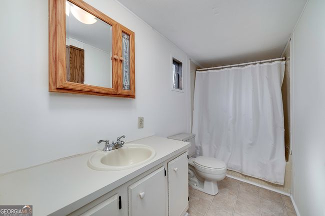 252 Lakeview Dr, House other with 3 bedrooms, 2 bathrooms and 2 parking in Locust Grove GA | Image 26